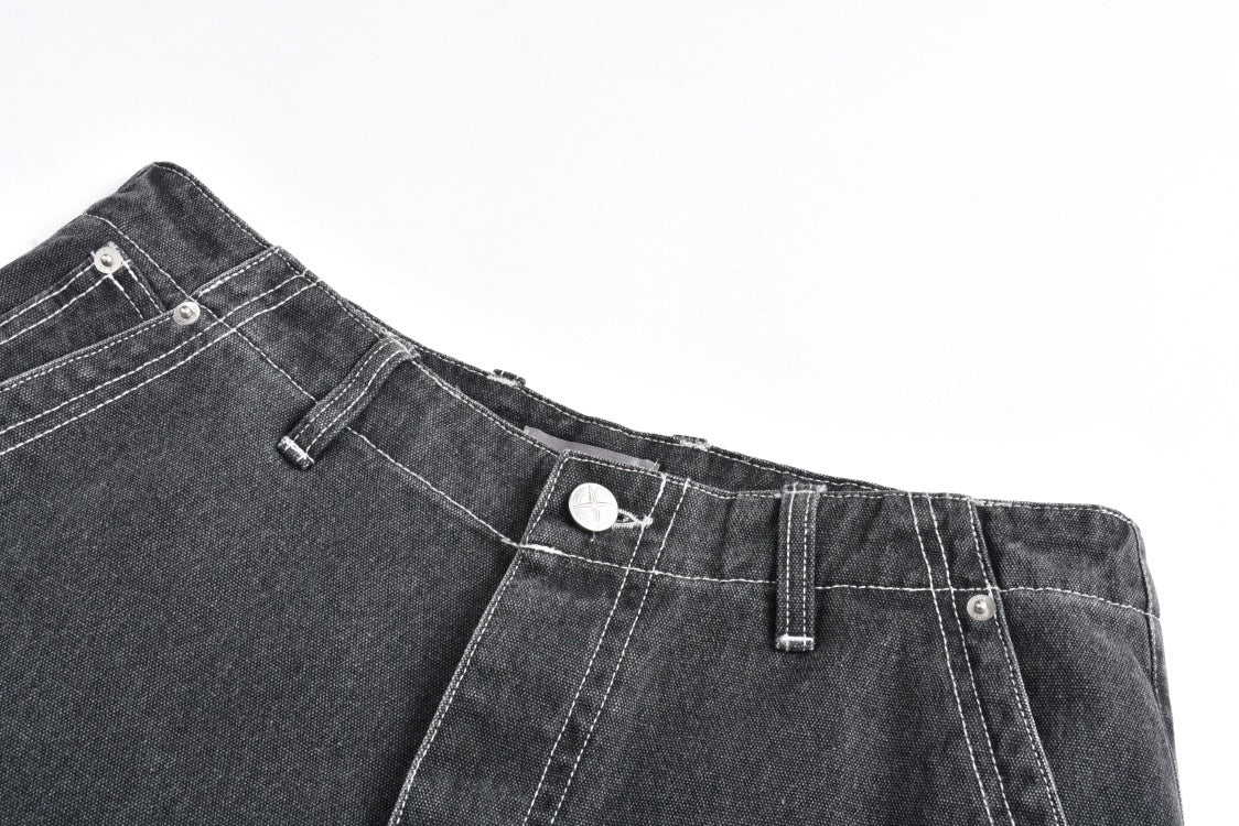 Multi-pocket patched leather jeans