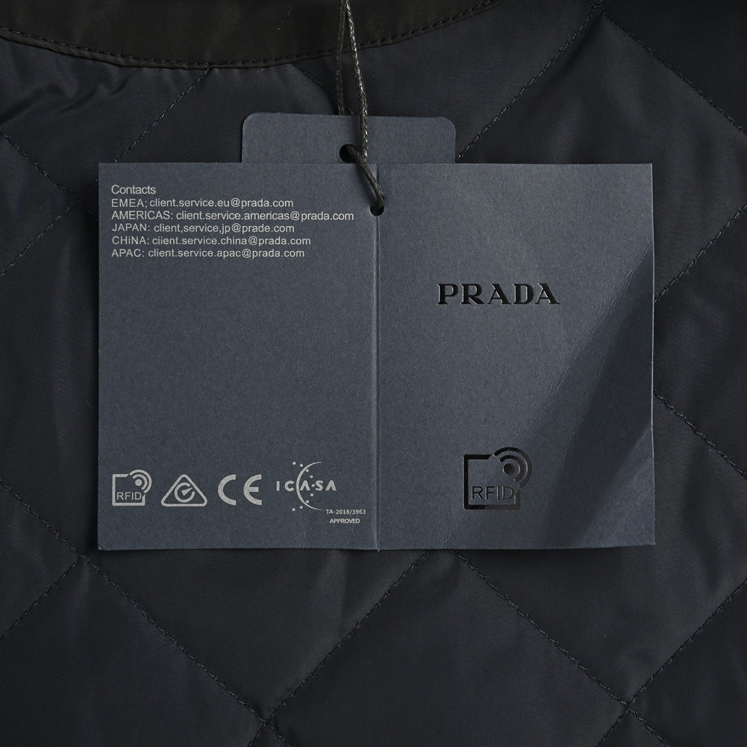 Corduroy collar triangle logo diamond quilted jacket