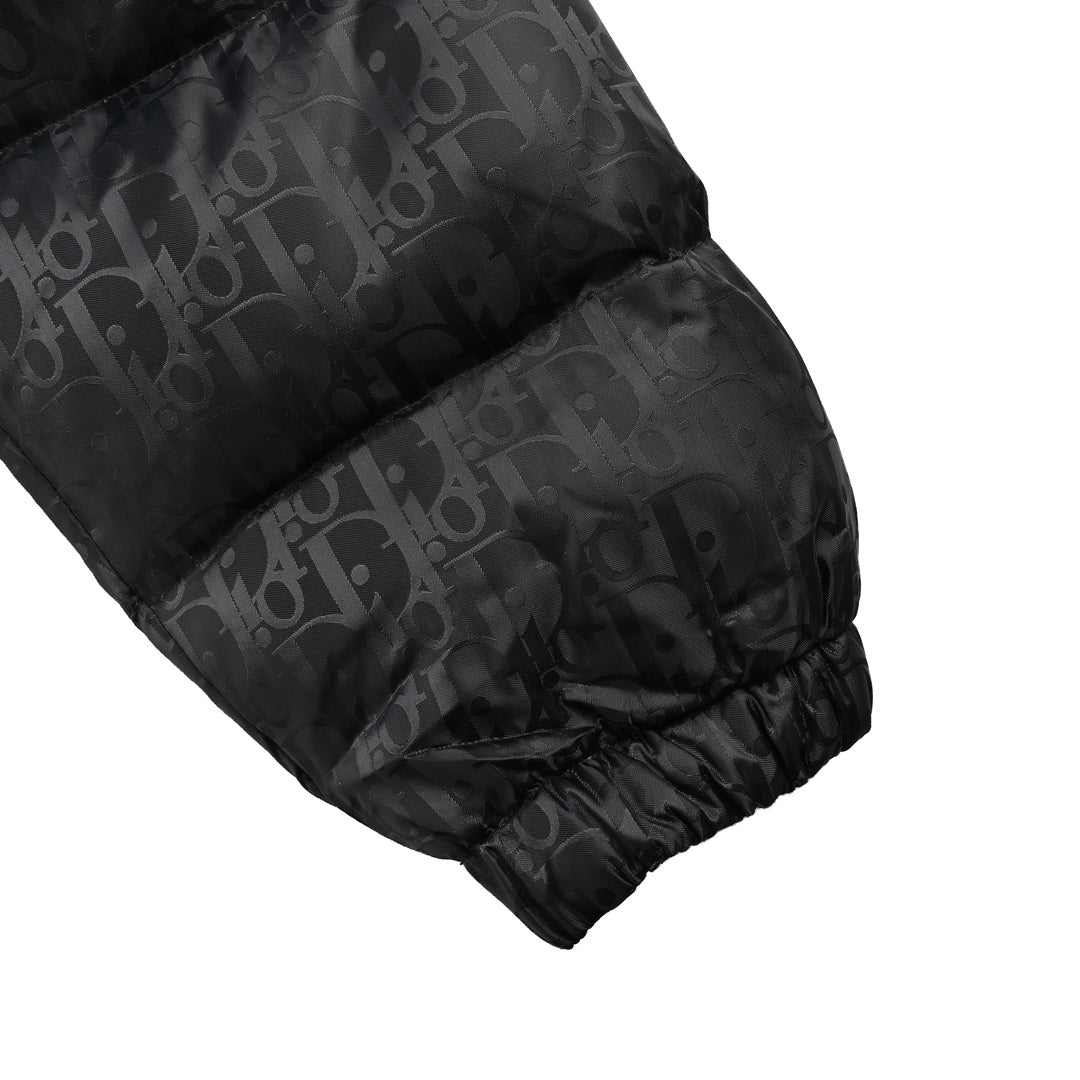 Down jacket with all-over dark pattern and monogram